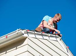 hanging christmas lights on your gutters