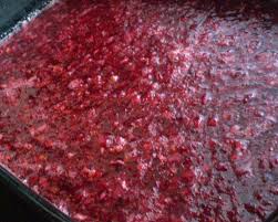 cranberry salad in raspberry jello with