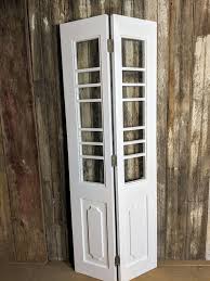 Bi Fold White Door With Multiple Window