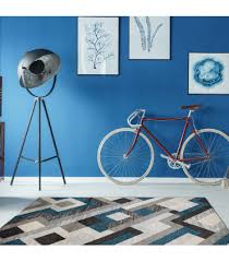 art geometric rug with a modern blue