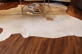 how to get wrinkles out of cowhide rugs