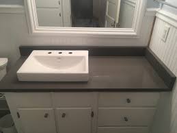 Quartz is one of the toughest materials available for your vanity countertop. Heirloom Grey Quartz Premier Granite