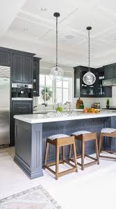 Black painted window frames, white subway tile and a checkerboard floor play off new brass hardware on the cabinets in this neutral kitchen. 44 Gray Kitchen Cabinets Dark Or Heavy Dark Light Modern