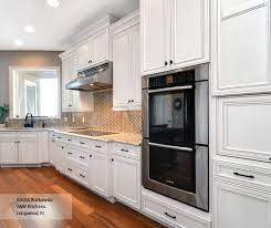 Antique white kitchen cabinets glazed by pinterest. White Glazed Kitchen Cabinets Omega Cabinetry