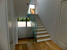modern stair railing that goes far