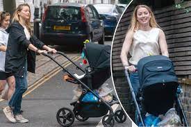 Amber Heard takes daughter for walk ...