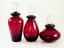 vintage ruby red bottles with clear