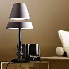 Both employ the same levitating tricks that allow the top end of the shades to stay suspended in mid air. Levitating Lamp Shades Floating Light
