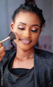 makeup brush woman