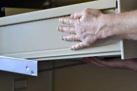 The drawer secures to the cabinet with a suspension rail. How To Remove A Hon File Cabinet Drawer Hunker Filing Cabinet Cabinet Drawers Cabinet