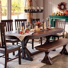 This valuable oval dining table will bring the room together as it draws in with its glossy design. Rustic Brown Oval Wood Brooklynn Extension Dining Table World Market Oval Table Dining Oval Dining Room Table Dining Table