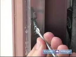 adjust a sliding screen door lock