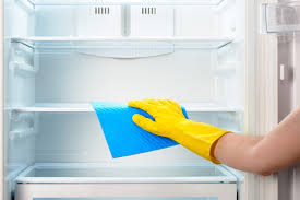 how to clean a refrigerator the maids