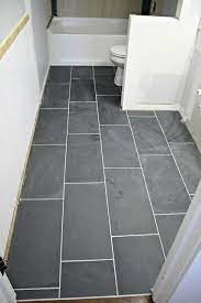 how to tile a bathroom floor it s done