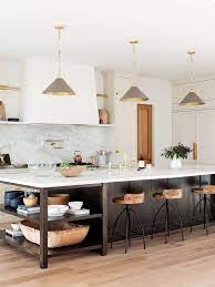 While they are lovely and can be incredibly practical for a kitchen layout, they won't fit into every space. These Kitchen Islands With Storage And Seating Are The Epitome Of Functional