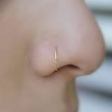 how-do-you-put-a-hoop-nose-ring-in-for-the-first-time