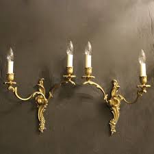 gilded twin arm antique wall lights