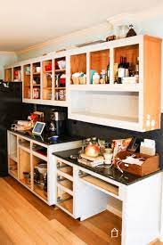 Instead, beginners should use a small roller to apply 100% latex paint made specifically for cabinets, like aristoshield, for a smooth look. Should I Paint My Kitchen Cabinets Designertrapped Com