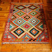 hand knotted wool area rug with