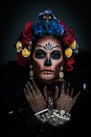 woman with a sugar skull makeup dressed