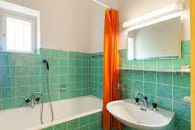 60s or 70s bathroom c w plumbing