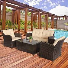 Outsunny Brown 4 Piece Iron Plastic Rattan Patio Furniture Set With Beige Cushions 2 Single Chairs Double Sofa And Tea Table