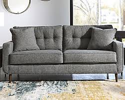 Ashley furniture earhart reclining sofa and loveseat living room set. Sofas Couches Ashley Furniture Homestore