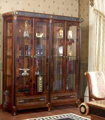 A corner showcase design will fit into the finickiest parts of your room with ease, transforming dead space into a design element. Dining Room Wooden Showcase Designs For Dining Room We Highly Hope That Our Artistic Dini Italian Style Furniture Luxury Furniture Living Room Display Cabinet