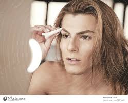 androgynous male with long hair