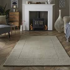 esme wool bordered plain rug for living