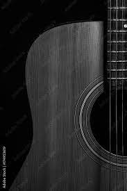 acoustic guitar in black and white