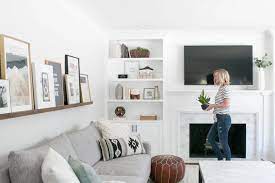 White Built Ins Around The Fireplace
