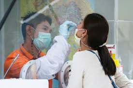 strained thai hospitals suspend testing
