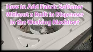 A measured amount of fabric softener is poured into the dispenser compartment of the washing machine. How To Add Fabric Softener Without A Built In Dispenser In Washing Machine Youtube