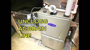 clean ac drain line with air compressor