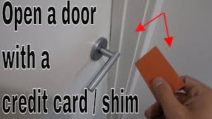 how to open a door with a credit card