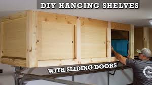 This quick build will keep things upright and ensure that the items take up as little space as possible. Diy Hanging Storage Shelves With Sliding Doors Overhead Garage Storage 13 Steps With Pictures Instructables