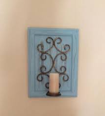 Iron Candleholder On Old Cabinet Door