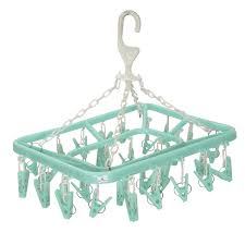 The clips are easy to use, permanently attached so they won't get lost, and strong (i have not had anything fall off by accident). Kuber Industries 360 Degree 32 Clip Portable Folding Clothes Drying Rack Space Saving Travel Rotatable Clips Plastic Clothesline Hanging Underwear S