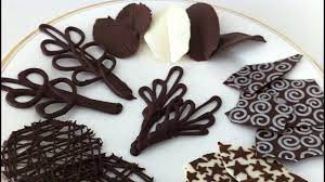 Suppliers of the finest chocolate decorations for cakes, cupcakes and desserts, including making your own chocolates. How To Make Chocolate Garnishes Decorations Tutorial Part 2 How To Cook That Ann Reardon Youtube