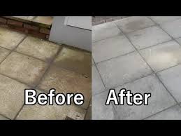 A mixture of water and vinegar. How To Clean Flagstone Paths Easily Quickly Cheaply Youtube