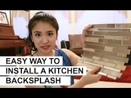 How to install a simple subway tile kitchen backsplash. How To Install A Glass Tile Backsplash This Old House Youtube Diy Kitchen Backsplash Diy Backsplash Backsplash