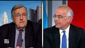 Shields and Brooks on the mail bombs and politics as an identity | PBS News