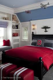 boy s room with red and gray bedding