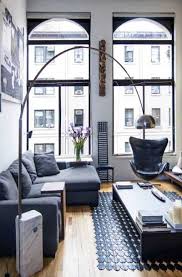 With the right sized furniture, this decorating strategy can make a layout look more like a deliberately open floor plan—not just a one room apartment. 17 Black Living Room Decor Ideas Sebring Build Design