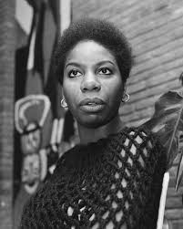 Her black hair was drawn into a tight bun. Nina Simone Wikipedia