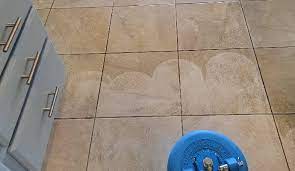 remove wax buildup from tile floors