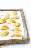 What is the best way to reheat empanadas?