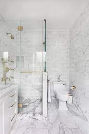 Bring your bathroom to a whole new level, and experience the true luxury and playfulness. Splendid Carrara White Marble Tile With Mirror Medicine Cabinet Brown Floor White Marble Bathrooms Carrera Marble Bathroom Small Bathroom Remodel