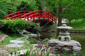 Red Bridge In Japanese Garden Stock